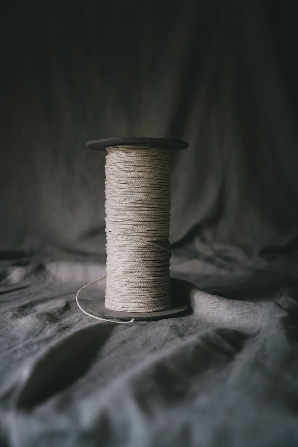 a spool of organic cotton wick for candle dipping